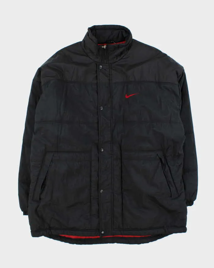 Vintage 1990s Black Nike Oversized Long Puffer Jacket - XL sold by Rokit