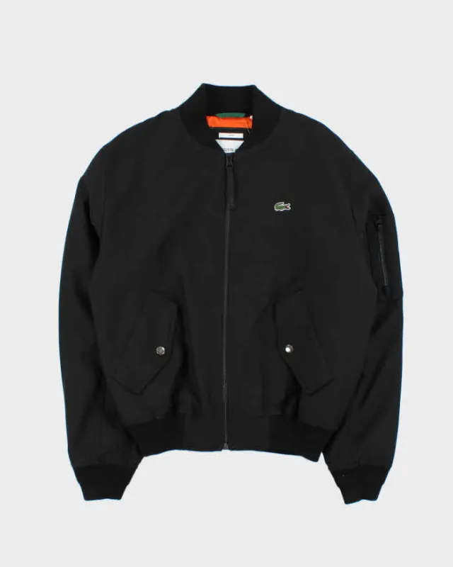 Vintage Unisex Lacoste Wool Blend Spell Out MA-1 Oversized Bomber Jacket - S sold by Rokit
