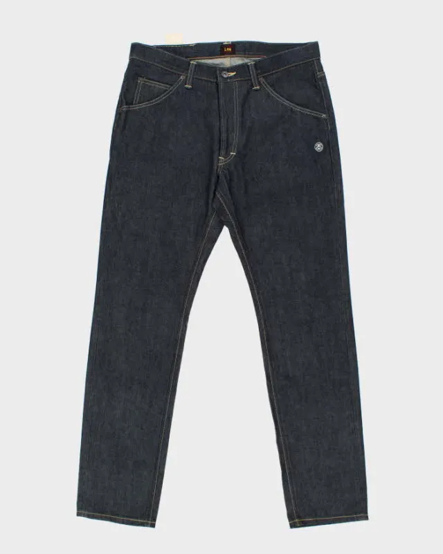 Deadstock Lee x Stussy Raw Japanese Denim Slim Straight Leg Jeans - W34 L32 sold by Rokit