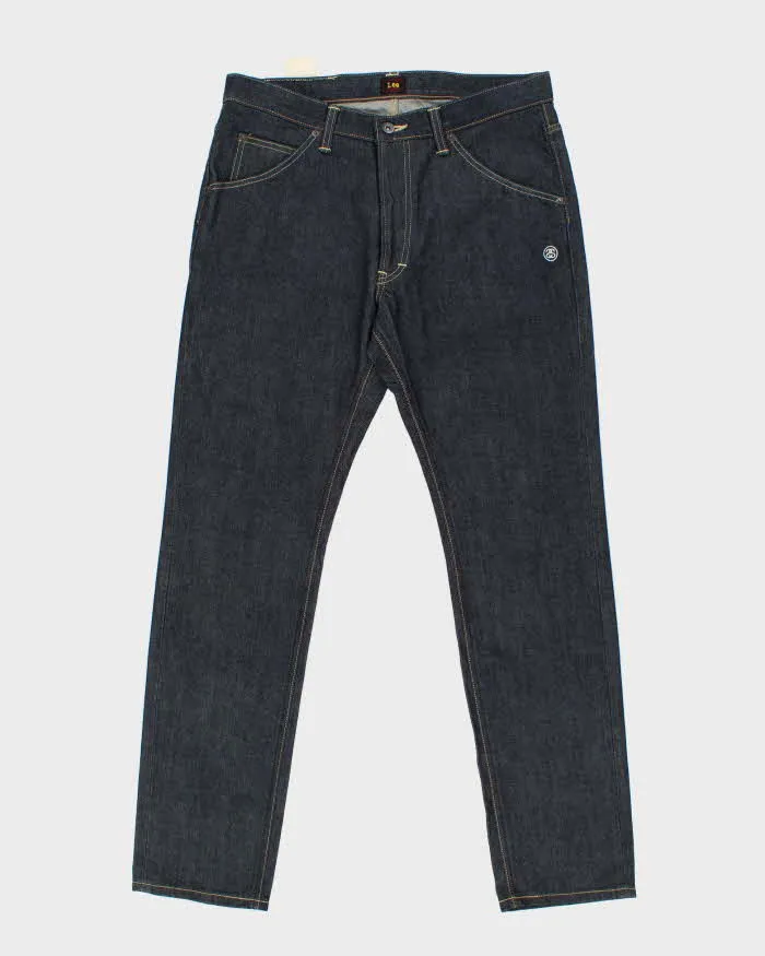 Deadstock Lee x Stussy Raw Japanese Denim Slim Straight Leg Jeans - W34 L32 sold by Rokit