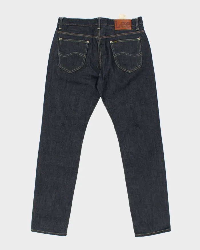 Deadstock Lee x Stussy Raw Japanese Denim Slim Straight Leg Jeans - W34 L32 sold by Rokit product image thumbnail 2