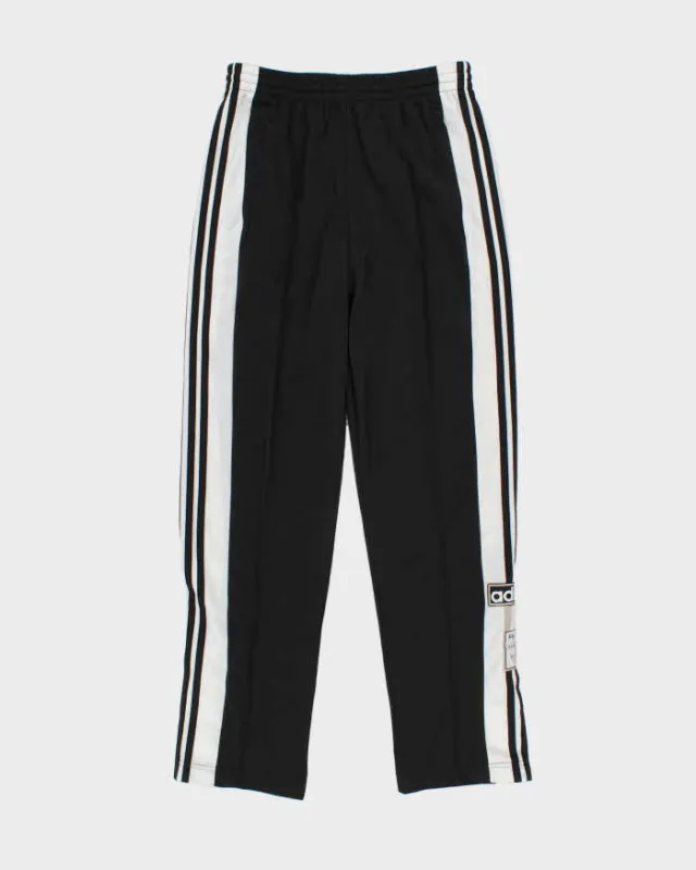 Vintage Adidas Popper Tracksuit Bottoms - S sold by Rokit