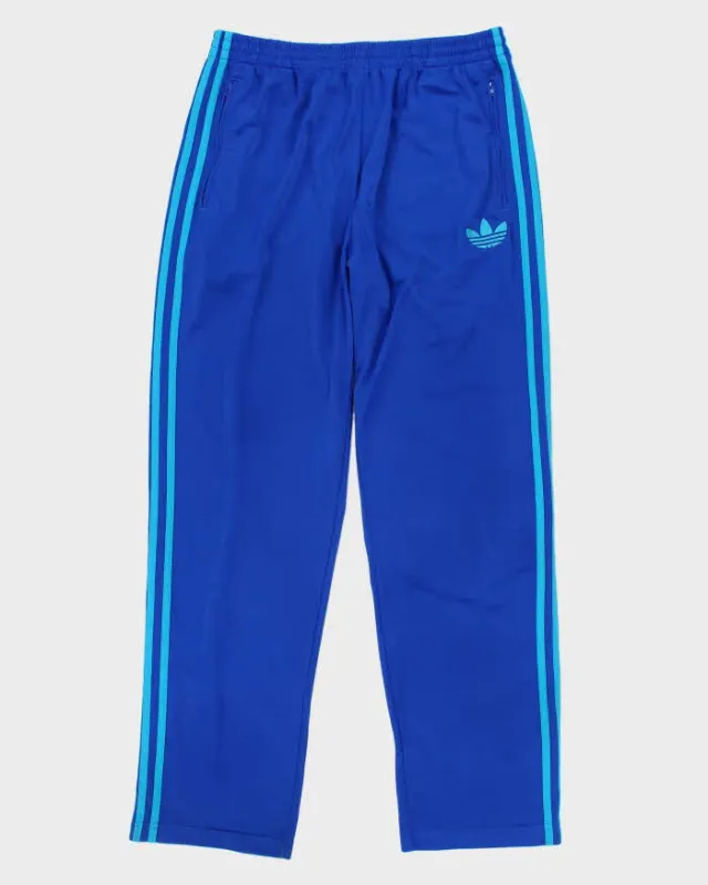 Vintage Adidas Wide Leg Tracksuit Bottoms - L sold by Rokit