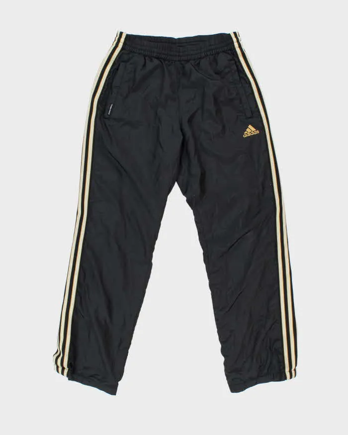 Vintage 00s Adidas ClimaProof Soft Shell Tracksuit Bottoms - S sold by Rokit