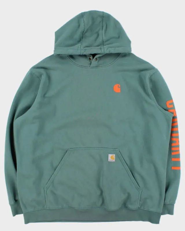 Vintage Carhartt Teal Loose Fit Rain Defender Heavyweight Pullover Hoodie - XXL sold by Rokit