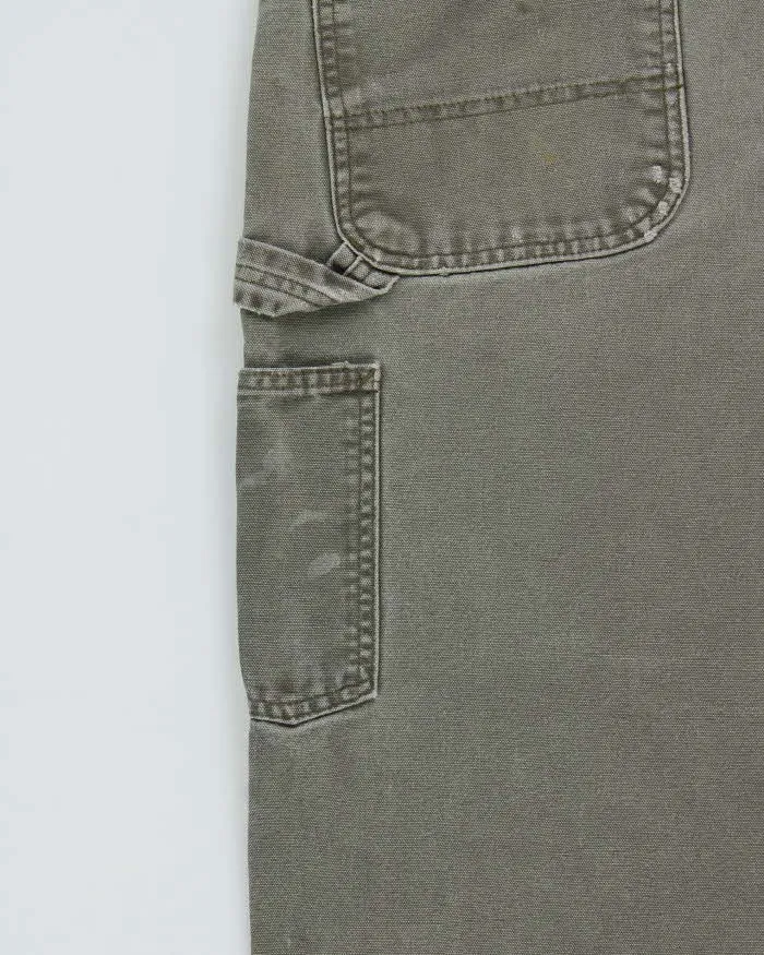 Vintage Y2K 00s Carhartt Khaki Dungaree Fit Wide Leg Distressed Workwear Trousers - W34 L32 sold by Rokit product image thumbnail 5