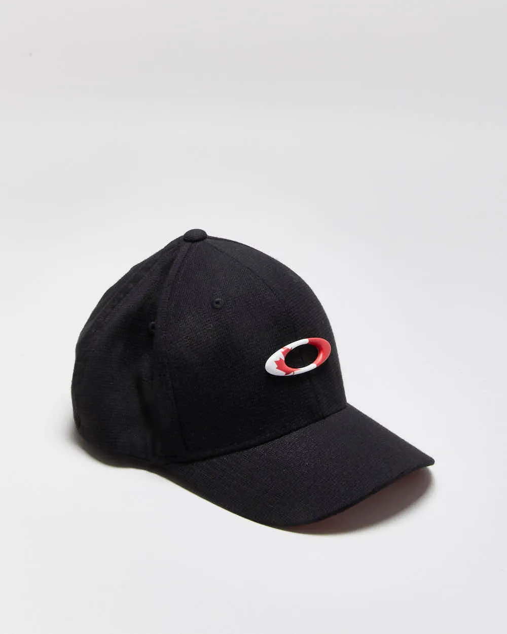 Vintage Oakley Canada FlexFit Baseball Cap - L/XL sold by Rokit