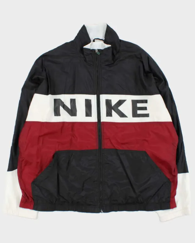 Vintage 1990s Nike Spell Out Windbreaker - XL sold by Rokit