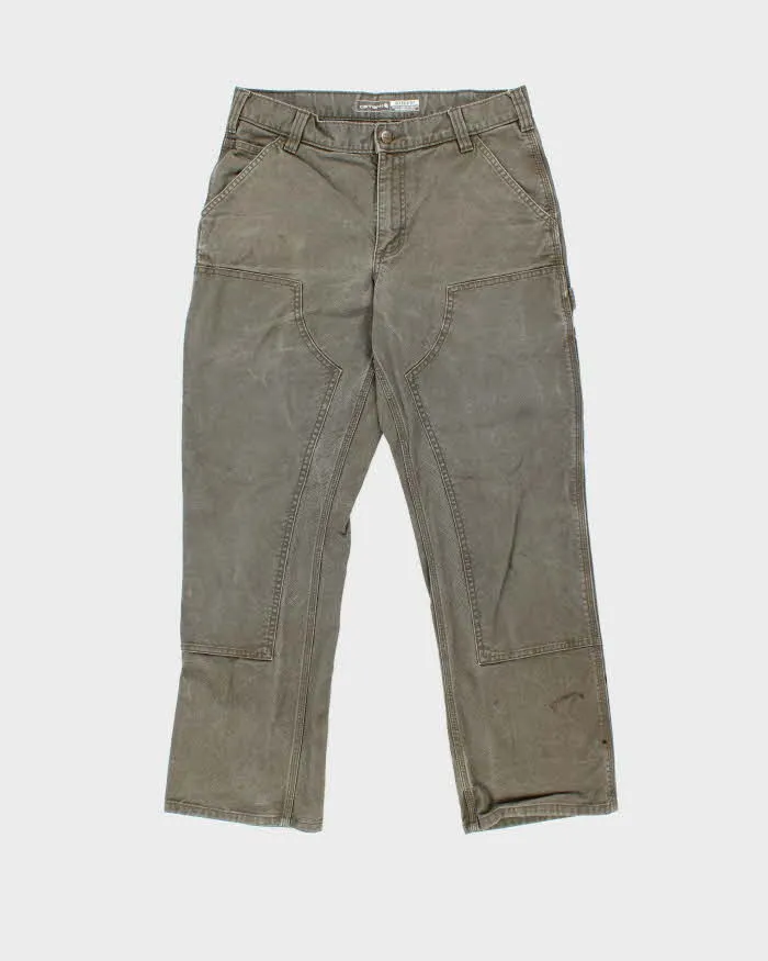 Vintage Carhartt Duck Double Knee Rugged Flex Relaxed Fit Distressed Workwear Trousers - W32 L29 sold by Rokit