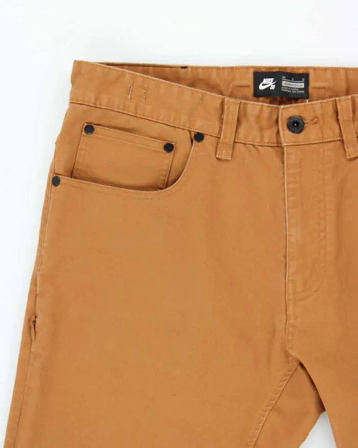 Vintage Nike SB Skate Slim Straight Tan Chino Trousers - W34 L30 sold by Rokit product image thumbnail 3