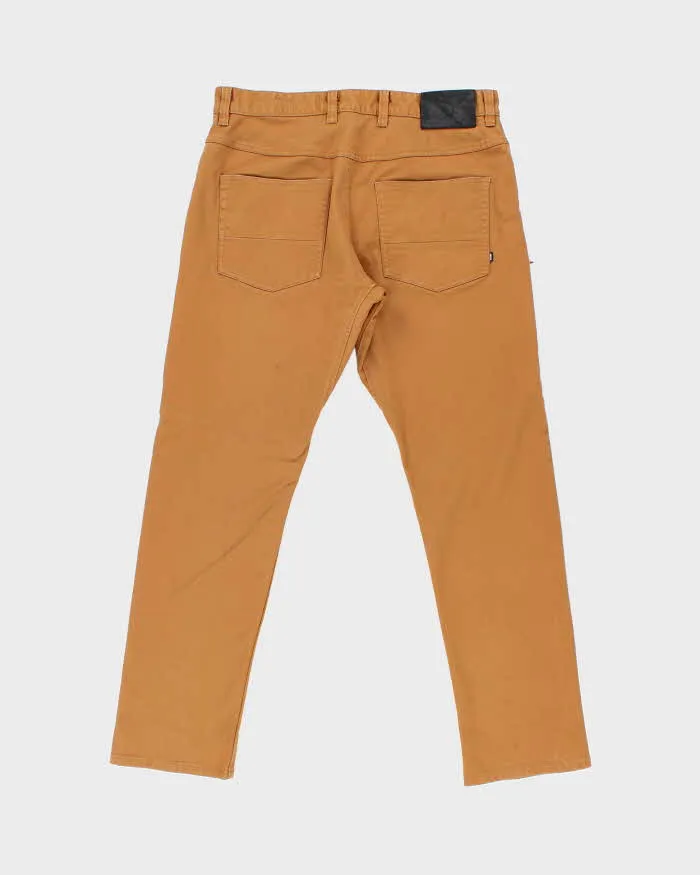 Vintage Nike SB Skate Slim Straight Tan Chino Trousers - W34 L30 sold by Rokit product image thumbnail 2