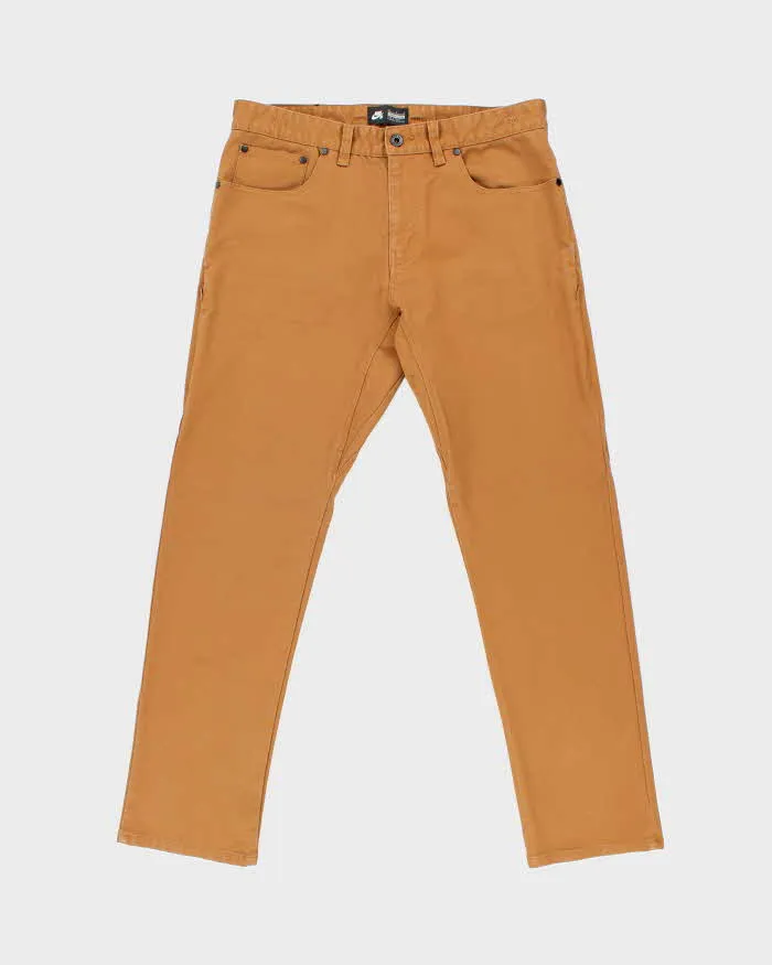 Vintage Nike SB Skate Slim Straight Tan Chino Trousers - W34 L30 sold by Rokit
