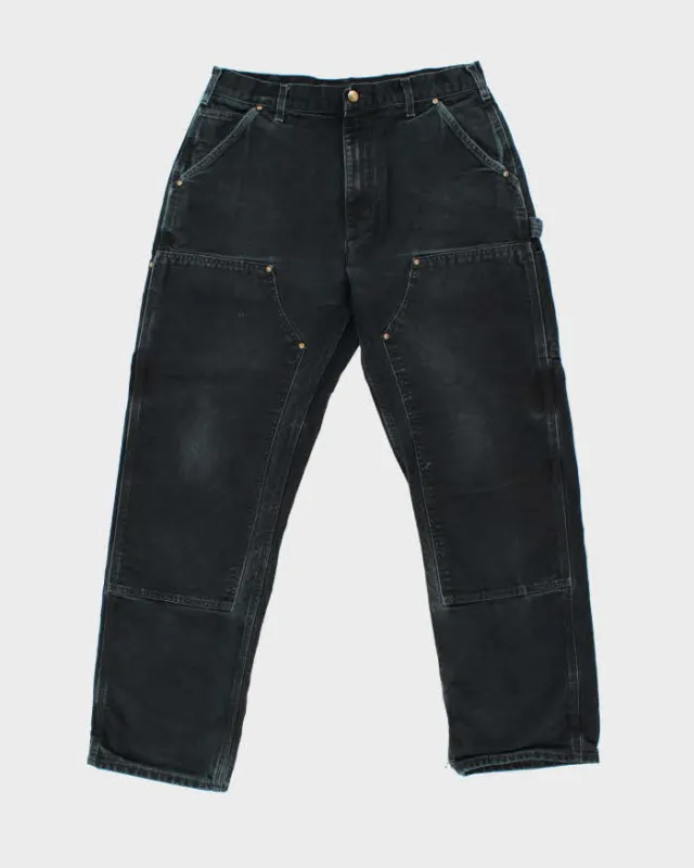 Vintage Y2K 00s Carhartt B01 Duck Canvas Double Front Made In USA Loose Original Fit Carpenter Trousers - W34 L32 sold by Rokit