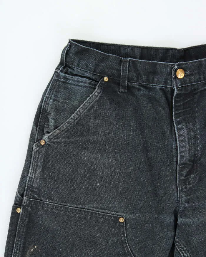 Vintage Carhartt B01 BLK Duck Canvas Double Front Loose Fit Made In USA Distressed Carpenter Trousers - W33 L30 sold by Rokit product image thumbnail 3