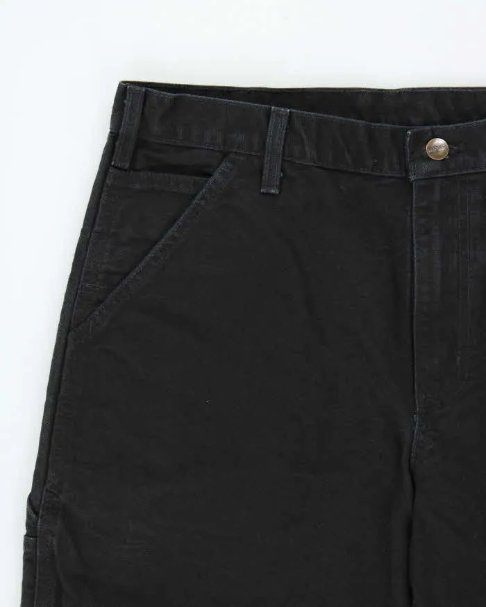 Vintage Carhartt B11 BLK Loose Fit Duck Cotton Workwear Trousers - W33 L30 sold by Rokit product image thumbnail 3
