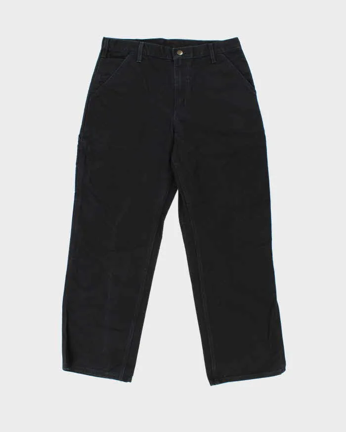 Vintage Carhartt B11 BLK Loose Fit Duck Cotton Workwear Trousers - W33 L30 sold by Rokit