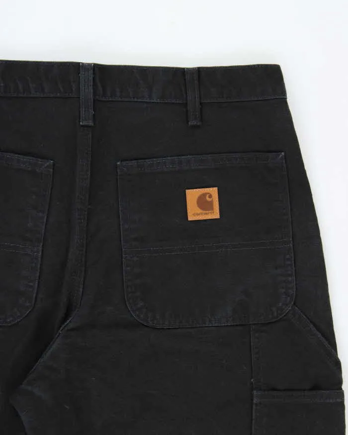 Vintage Carhartt B11 BLK Loose Fit Duck Cotton Workwear Trousers - W33 L30 sold by Rokit product image thumbnail 4