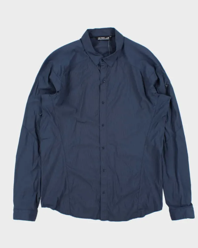 Vintage Arc'teryx Elaho Snap Button Long Sleeve Tech Shirt - L sold by Rokit