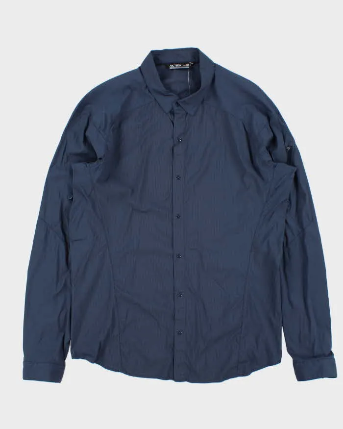 Vintage Arc'teryx Elaho Snap Button Long Sleeve Tech Shirt - L sold by Rokit