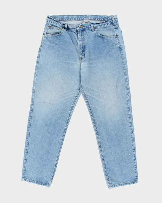Vintage 1990s Carhartt Light Wash Relaxed Tapered Fit Denim Jeans - W38 L32 sold by Rokit