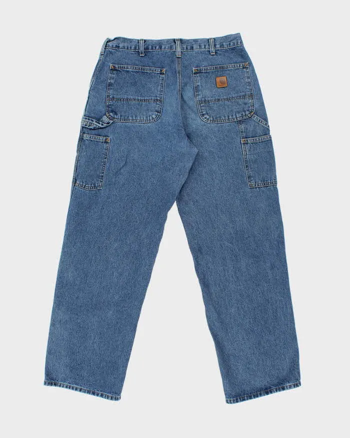 Vintage Carhartt B13 Original Dungaree Fit Denim Carpenter Jeans - W34 L32 sold by Rokit product image thumbnail 2