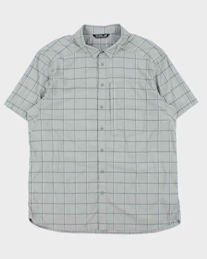 Vintage Arc'teryx 'Reil' Window Pane Check Short Sleeve Technical Shirt - XL sold by Rokit