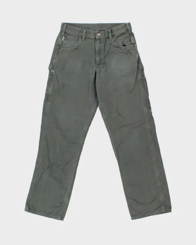 Vintage Carhartt B159 Dark Moss Canvas Loose Fit Carpenter Trousers - W30 L32 sold by Rokit