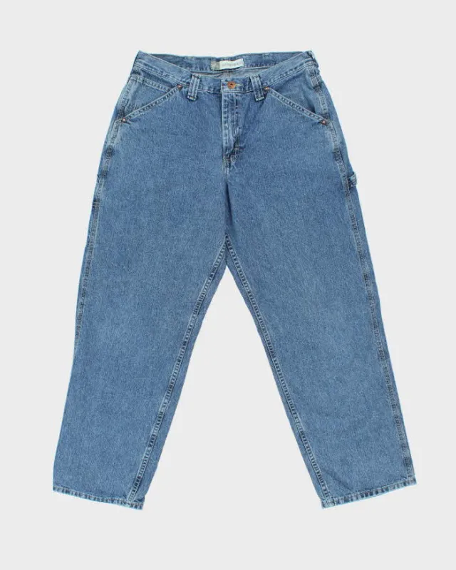 Vintage Y2K 00s Lee Dungarees Wide Leg Denim Carpenter Jeans - W34 L30 sold by Rokit