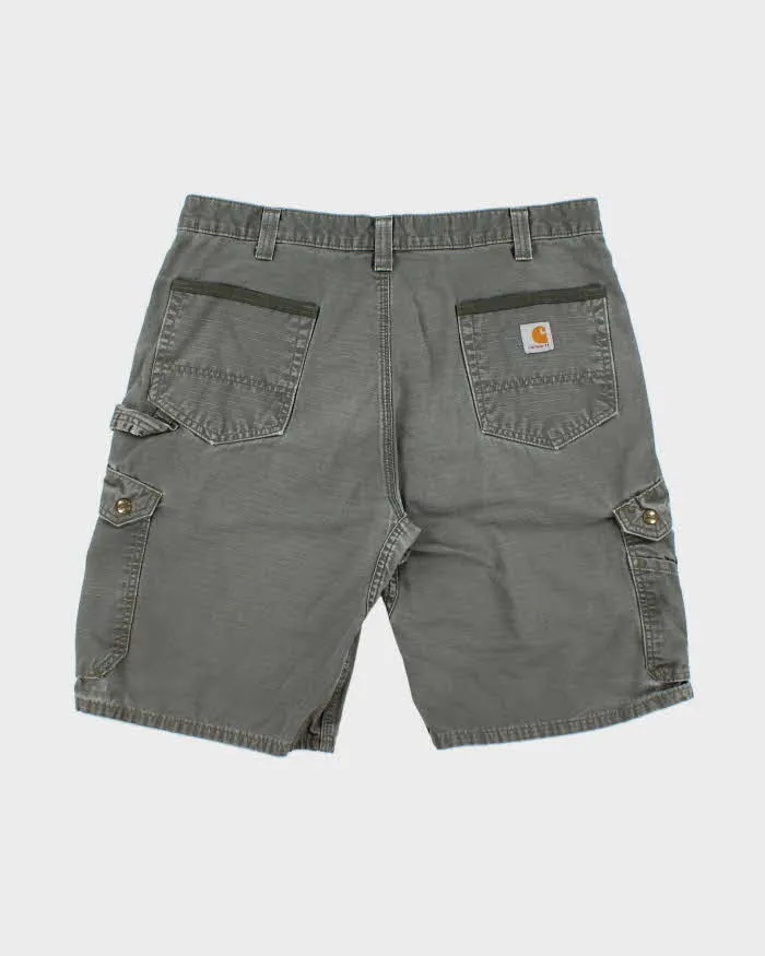 Vintage Carhartt B357 Moss Canvas Relaxed Fit Distressed Carpenter Shorts - W36 sold by Rokit product image thumbnail 2