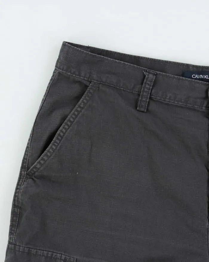 Vintage Calvin Klein Jeans Loose Fit Cargo Shorts - W32 sold by Rokit product image thumbnail 3