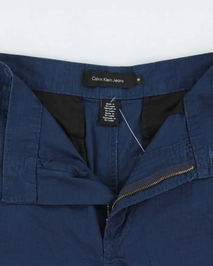 Vintage Calvin Klein Jeans Loose Fit Cargo Shorts - W36 sold by Rokit product image thumbnail 5