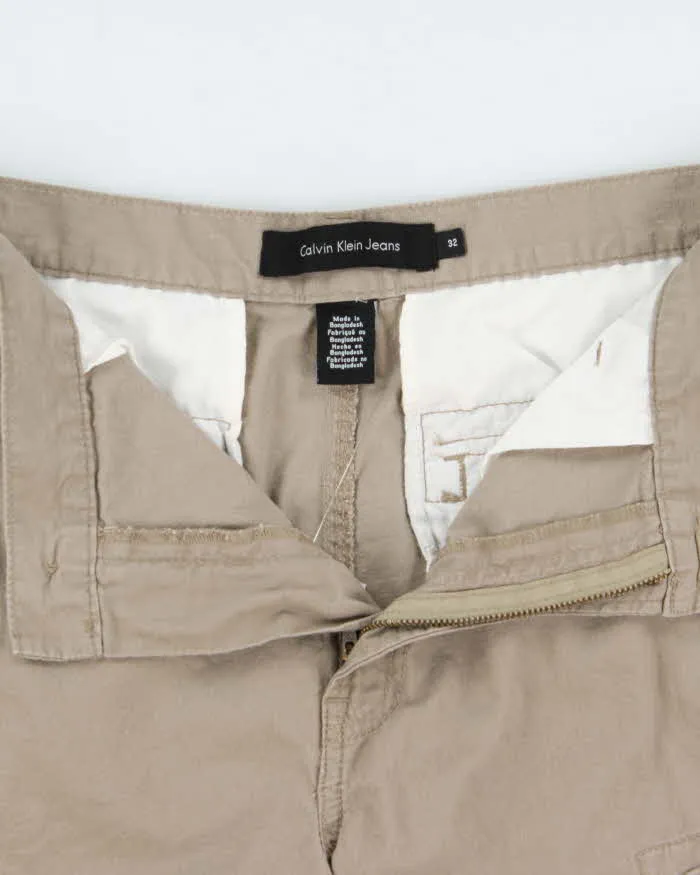 Vintage Calvin Klein Jeans Khaki Loose Fit Cargo Shorts - W32 sold by Rokit product image thumbnail 5