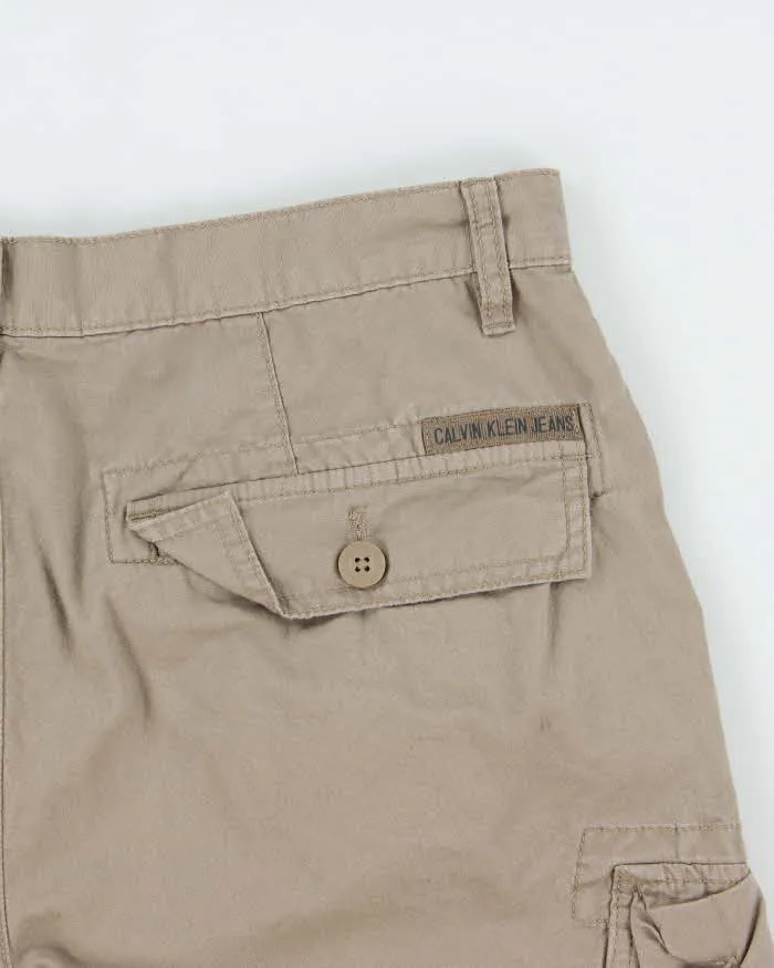 Vintage Calvin Klein Jeans Khaki Loose Fit Cargo Shorts - W32 sold by Rokit product image thumbnail 4