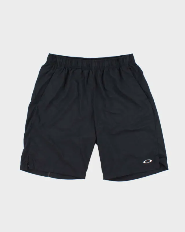 Vintage Oakley Soft Shell Loose Performance Fit Shorts - L made by Oakley
