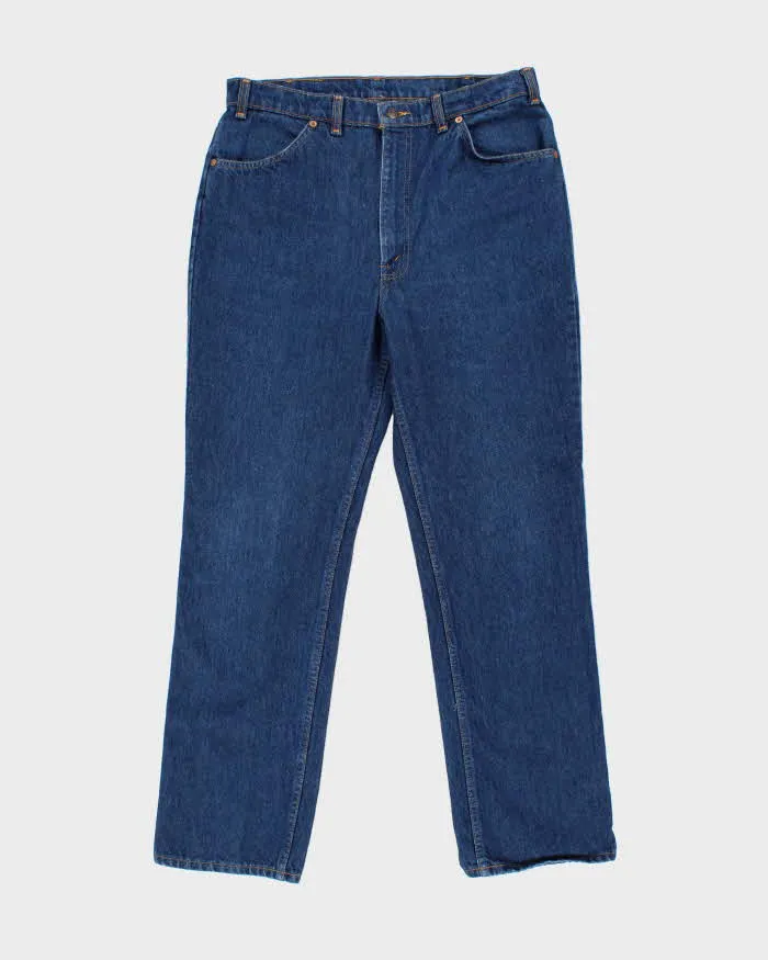 Vintage 1994 Levi's 619 Orange Tab Made In Canada Leather Patch High Waisted Relaxed Straight Leg Jeans - W34 L31 sold by Rokit