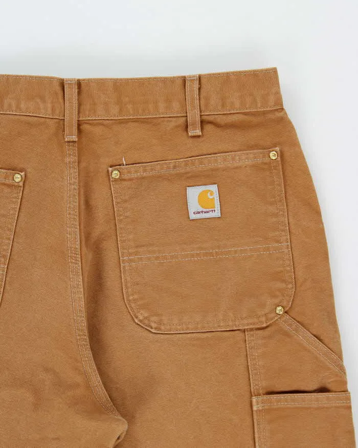 Vintage Carhartt B01 BRN Made In USA Firm Duck Double-Front Loose Fit Carpenter Trousers - W34 L30 sold by Rokit product image thumbnail 4
