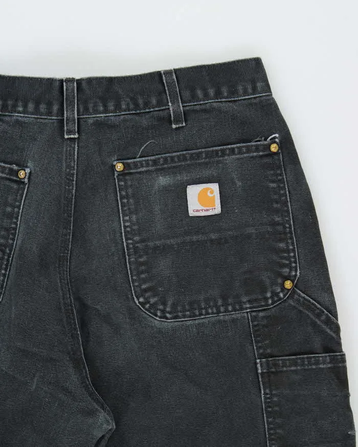 Vintage Carhartt B01 BLK Duck Canvas Double Knee Made In USA Distressed Loose Original Fit Carpenter Trousers - W32 L30 sold by Rokit product image thumbnail 4