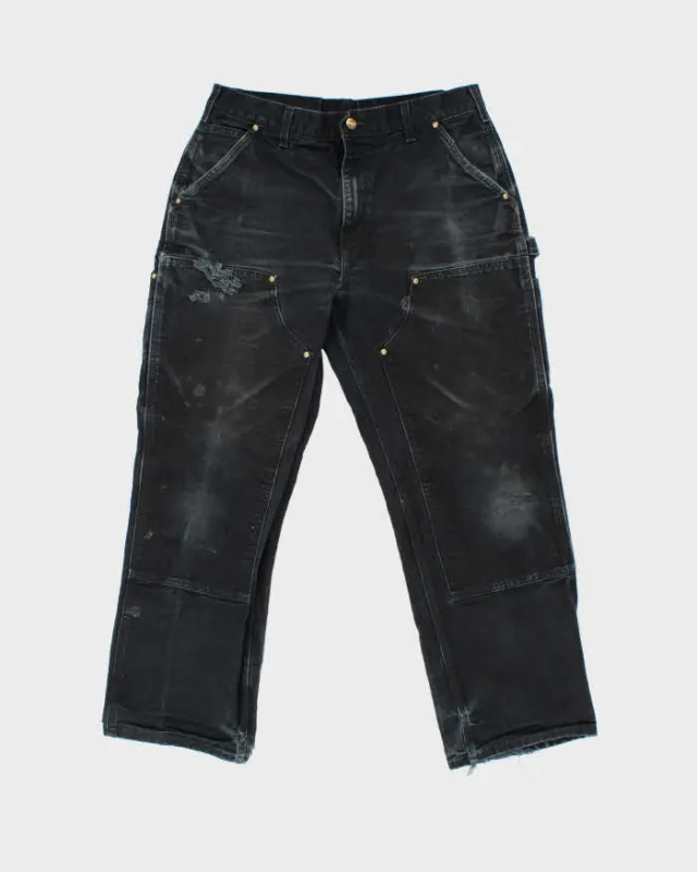 Vintage Carhartt B01 BLK Made In USA Firm Duck Double-Front Distressed Loose Original Fit Carpenter Trousers - W34 L29 made by Carhartt
