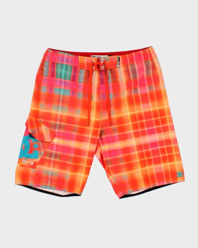 Vintage DC Shoe Co. Neon Check Relaxed Fit Board Shorts - W36 made by Rokit