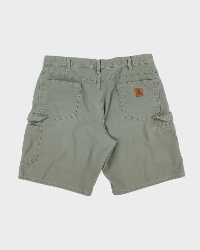 Vintage 2007 Y2K Carhartt B190 LDN Khaki Canvas Loose Fit Carpenter Shorts - W38 sold by Rokit product image thumbnail 2