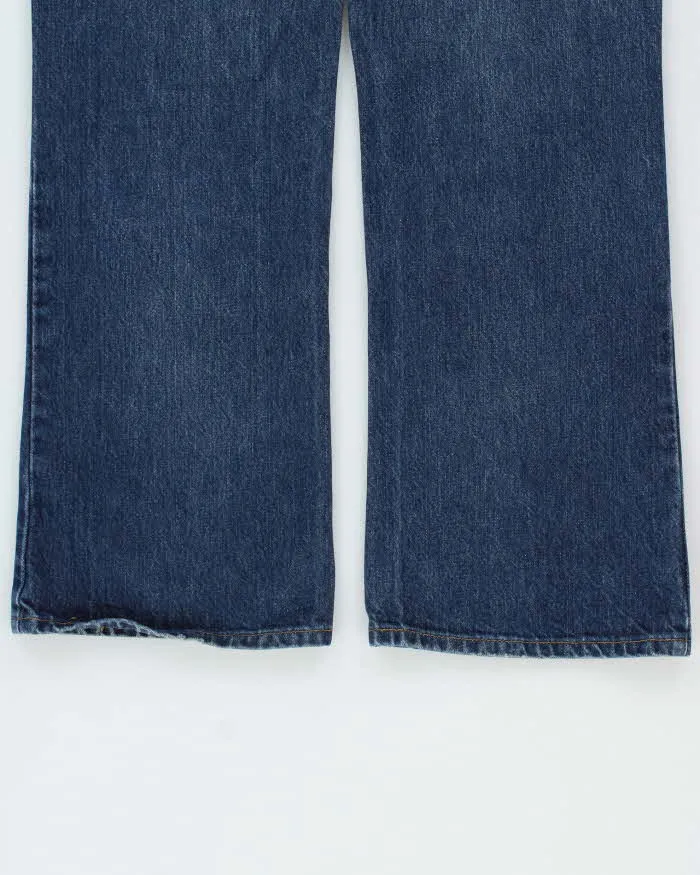 Vintage 1988 Lee Riders Made In Canada Mid Rise Dark Wash Denim Bootcut Jeans - W34 L30 sold by Rokit product image thumbnail 5