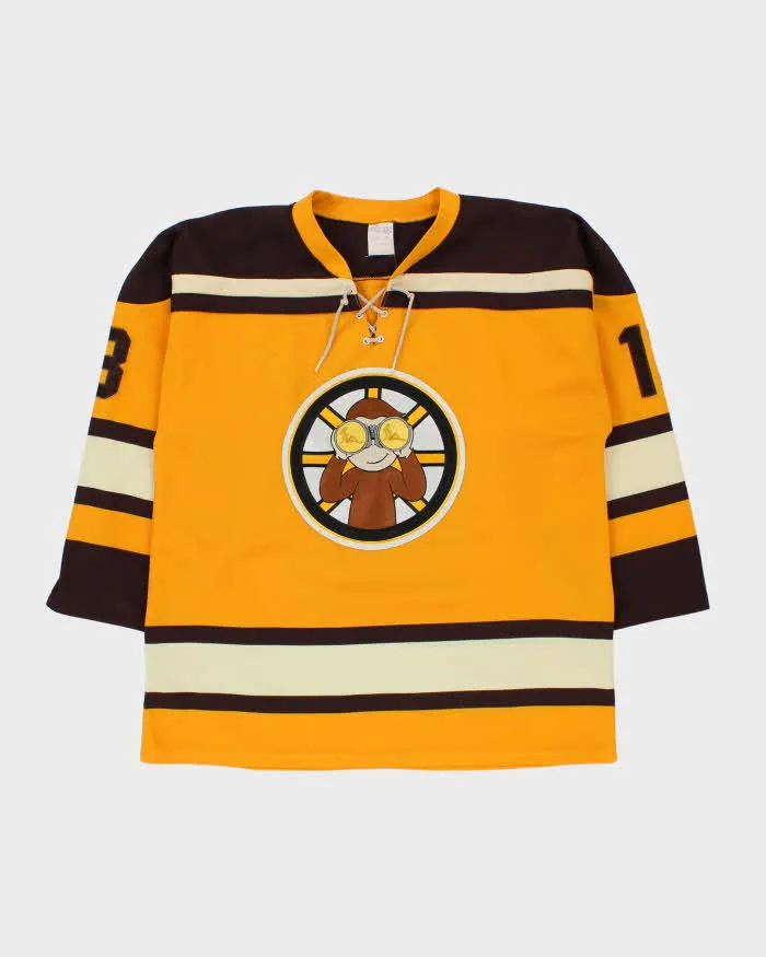 Vintage 1990s Athletic Knit Curious George #13 Made In Canada Ice Hockey Jersey - L sold by Rokit