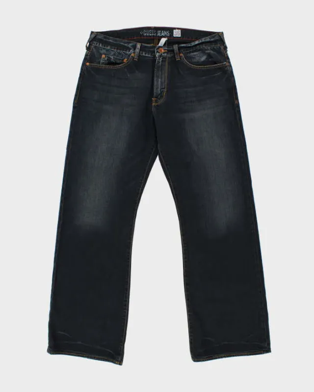 Vintage Y2K 00s Guess 'Cliff' Dark Stone Wash Denim Mid Rise Relaxed Leg Bootcut Jeans - W36 L33 made by Guess