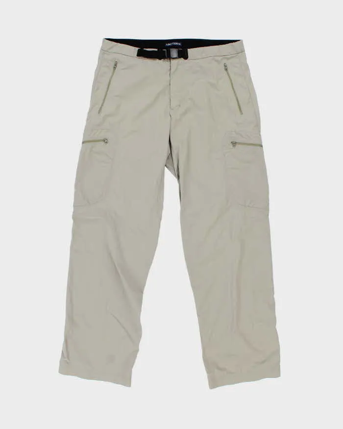 Vintage Y2K 00s Arc'teryx Desert Khaki Low Rise Relaxed Fit Wide Leg Technical Hiking Trousers - W34 L32 sold by Rokit