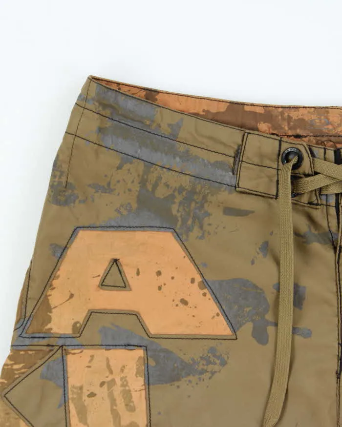 Vintage Y2K 00s Oakley Olive Khaki Embroidered Loose Fit Board Shorts - W34 sold by Rokit product image thumbnail 3