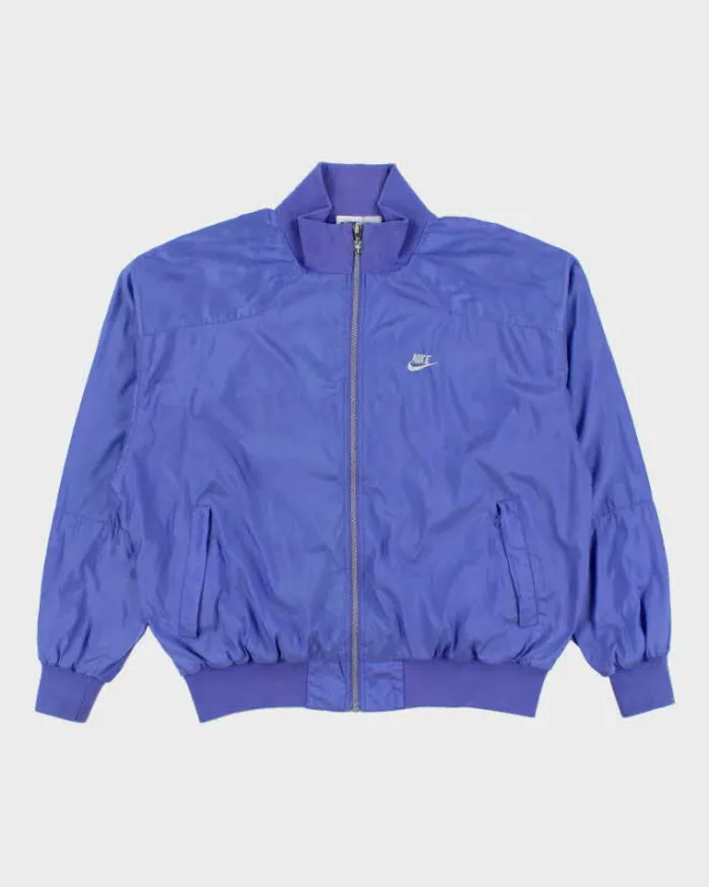 Vintage 1990s Nike International Lavender Soft Shell Embroidered Windbreaker Jacket - XL made by Nike