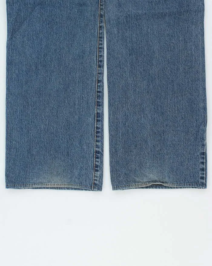 Vintage 2000s Calvin Klein Relaxed Loose Fit Jeans - W34 L30 sold by Rokit product image thumbnail 5