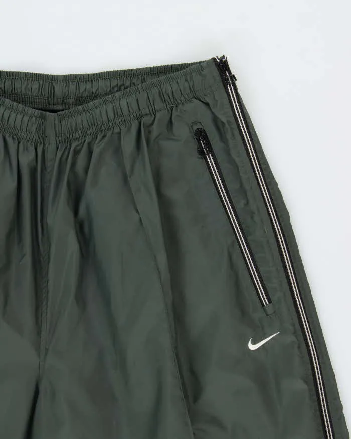 Vintage 1990s Nike Khaki Lightweight Waterproof Shell Baggy Wide Leg Zip Tracksuit Bottoms - XL sold by Rokit product image thumbnail 3