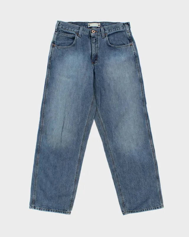Vintage Carhartt B189 Loose Fit Workwear Jeans - W32 L31 made by Ralph Lauren