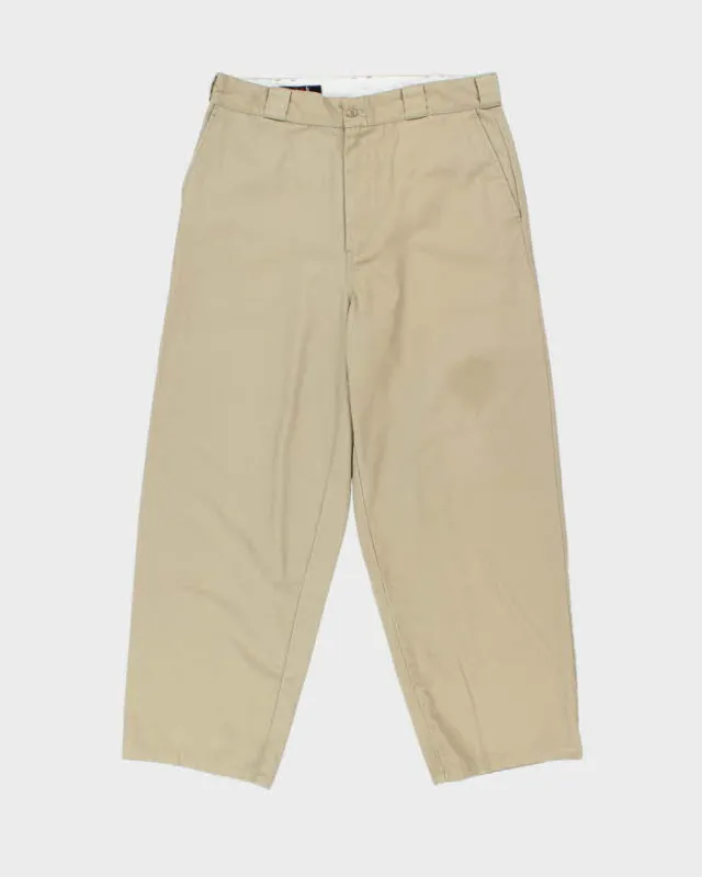 Vintage 1990s Vans Khaki Canvas High-Rise Relaxed Fit Wide Leg Baggy Skater Chinos - W34 L28 made by Vans